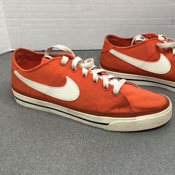 mens orange and white nike shoes